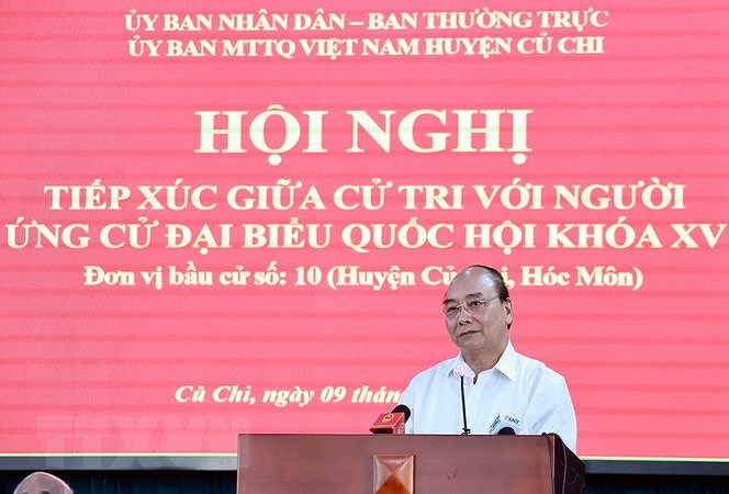 Chu tich nuoc Nguyen Xuan Phuc tiep xuc cu tri Thanh pho Ho Chi Minh hinh anh 1