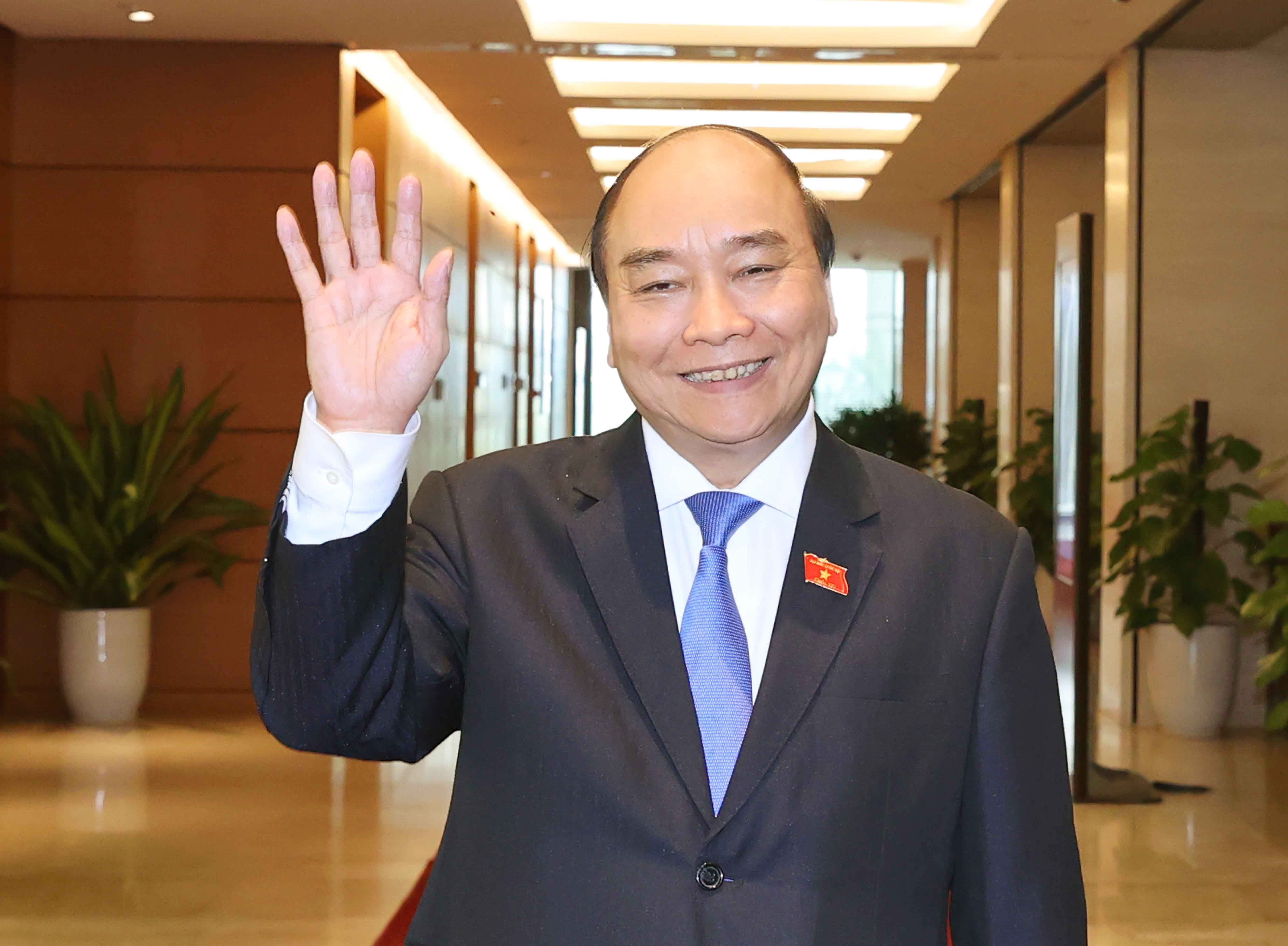越共十四届国会第十一次会议：国家主席提请国会免去政府总理职务 hinh anh 1