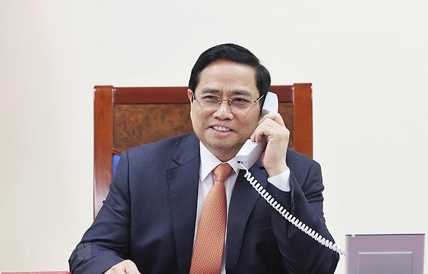 越南政府总理范明政与新加坡总理李显龙通电话 hinh anh 1
