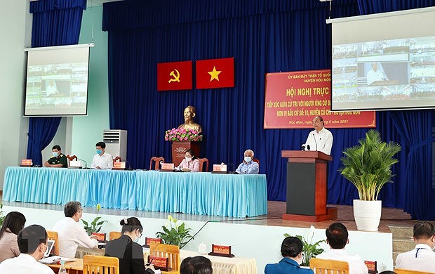 越南国家主席阮春福与胡志明市选民接触 hinh anh 1