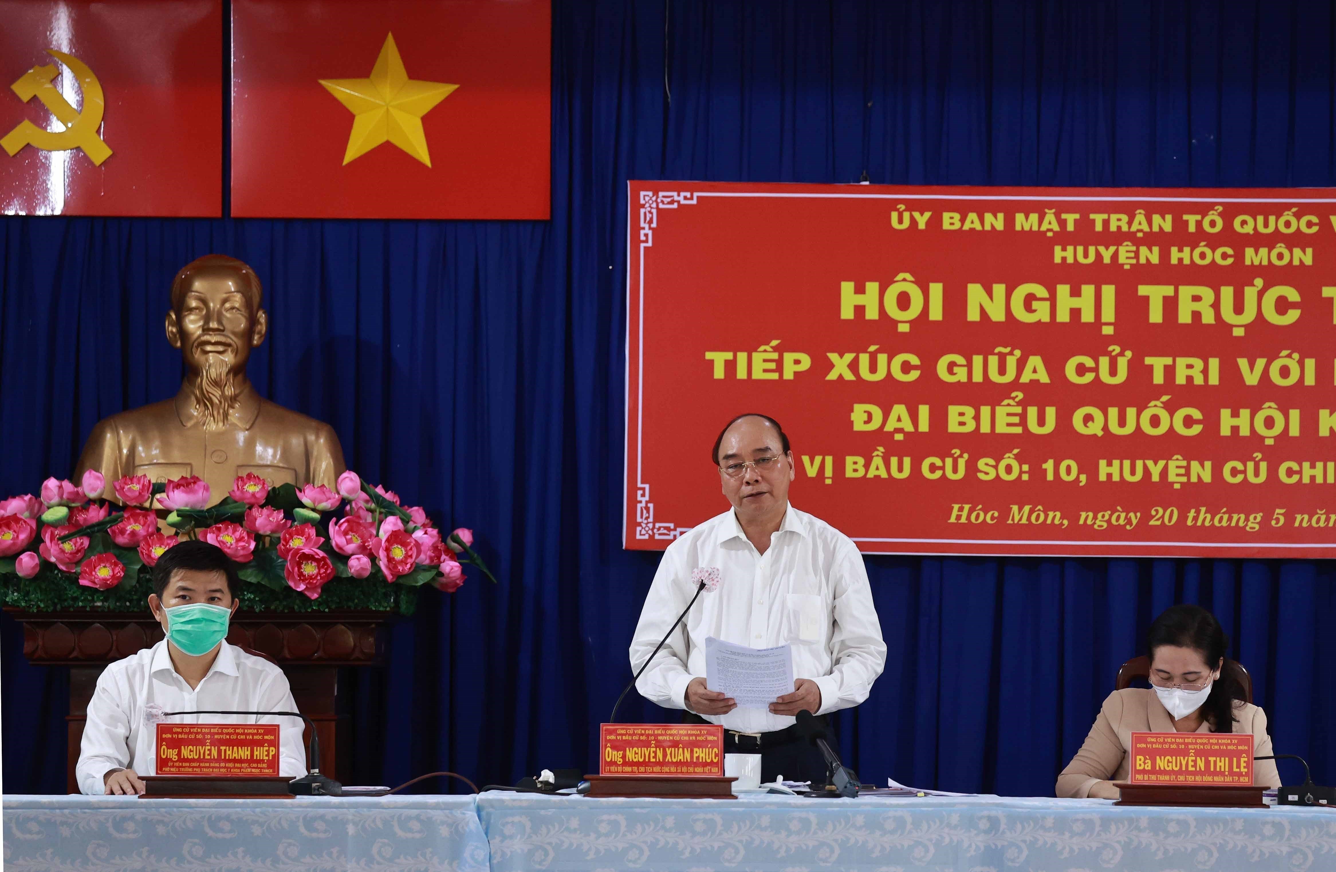 State President meets voters in HCM City’s Cu Chi and Hoc Mon districts hinh anh 3
