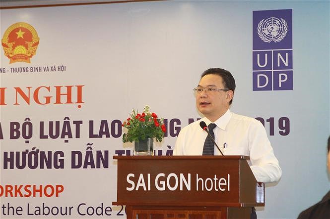 Meeting held to promote enforcement of 2019 Labour Code hinh anh 1
