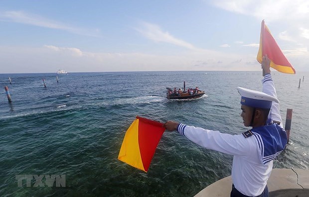 Vietnam resolutely rejects China’s unilateral fishing ban: Deputy Spokesman hinh anh 1