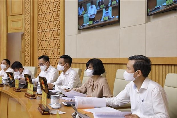Prime Minister Pham Minh Chinh chairs first regular Government meeting hinh anh 3