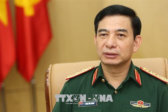 Vietnamese, Lao defence chiefs hold online talks hinh anh 1