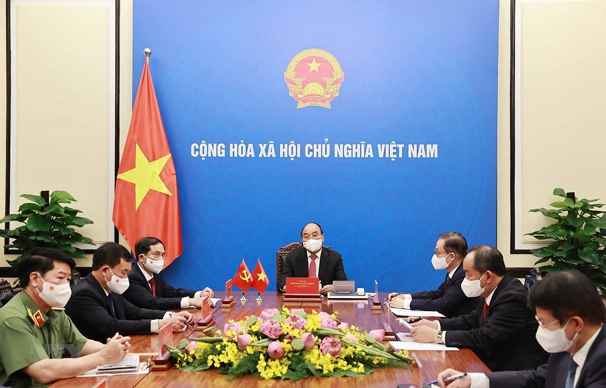 President holds phone talks with top Chinese leader hinh anh 1