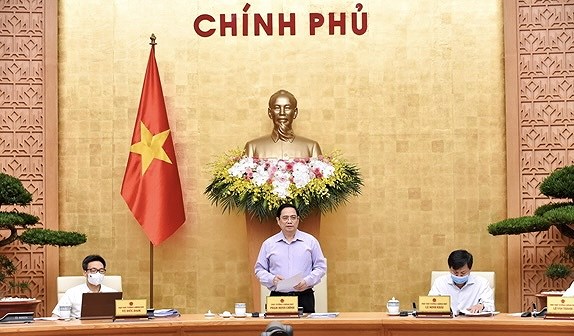 PM chairs Government meeting on law building hinh anh 1