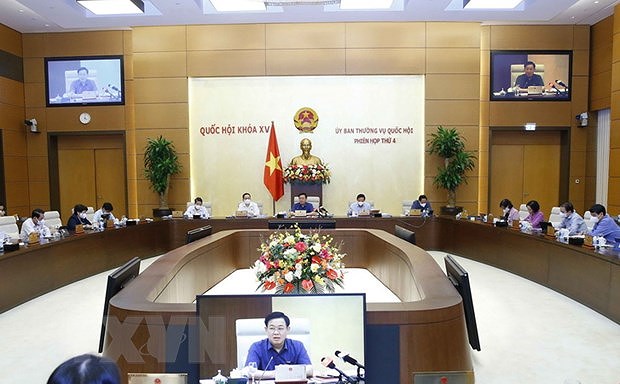 Legislators debate draft resolutions on development of Hai Phong, Nghe An, Thua Thien-Hue hinh anh 1