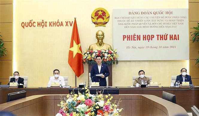 Issues of law-governed socialist State building discussed in detail hinh anh 1