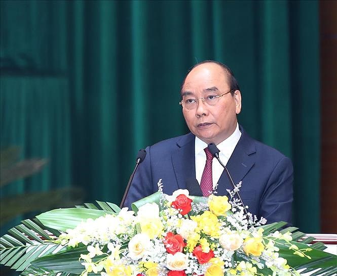 President attends national military-political conference hinh anh 1