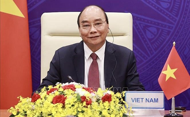 Le president Nguyen Xuan Phuc prononce un discours lors du Sommet sur le climat hinh anh 1