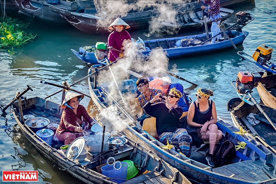 Красочная жизнь Вьетнама через объектив фотографов-женщин Хошимина hinh anh 11