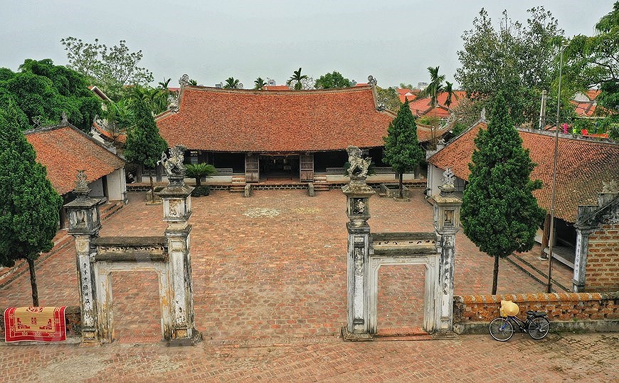 Древнии общинныи дом Монгфу: уникальная и самобытная архитектура в дельте Краснои реки hinh anh 2