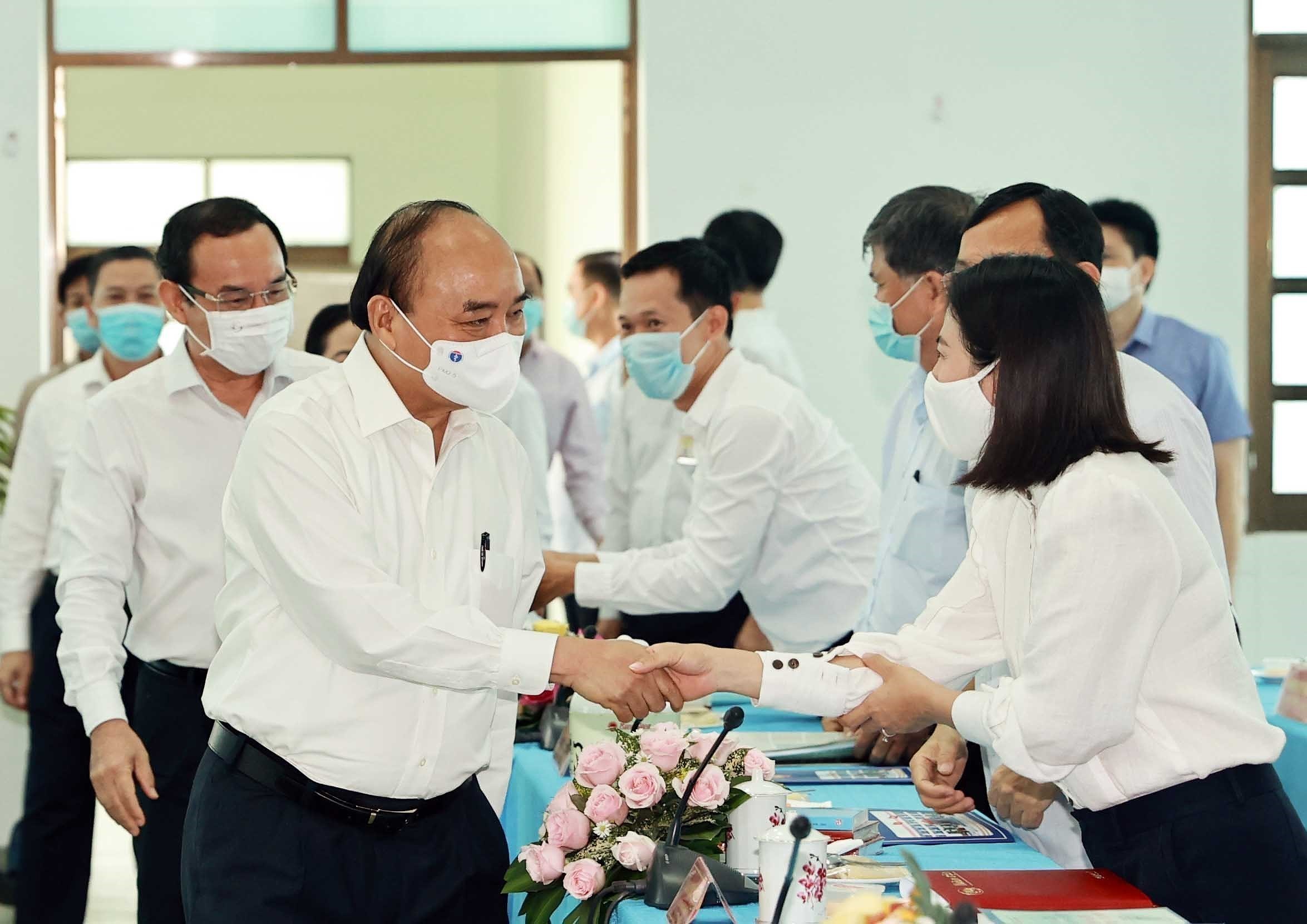 Президент Вьетнама провел рабочее совещание в уездах Кутьи, Хокмон города Хошимин hinh anh 1