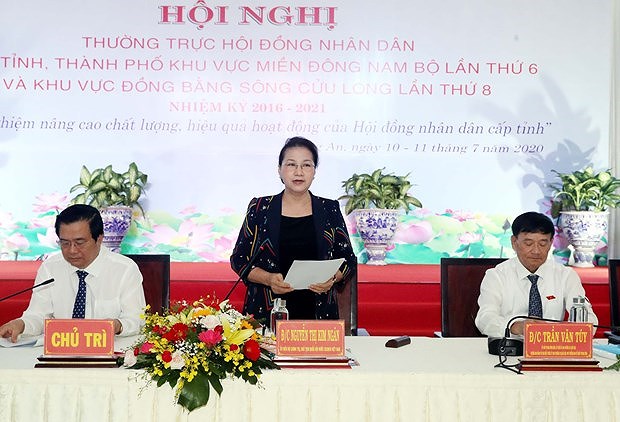 Председатель НС приняла участие в конференции народных советов южных местностеи hinh anh 1